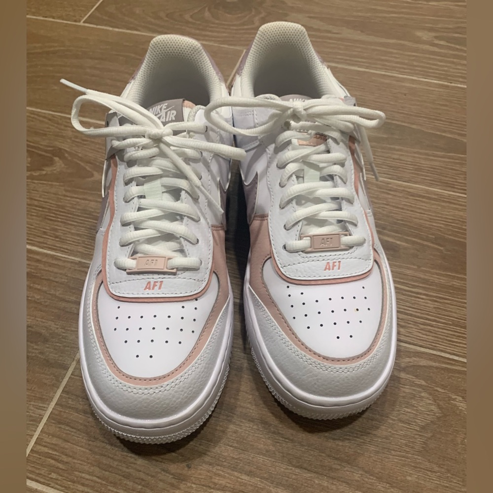 Woman’s Nike AF1 shoes.